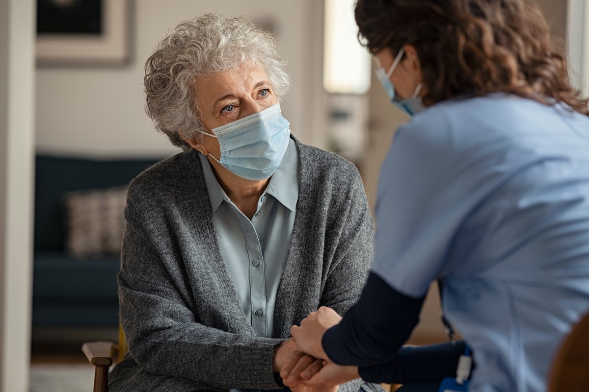 elderly woman getting a consultation